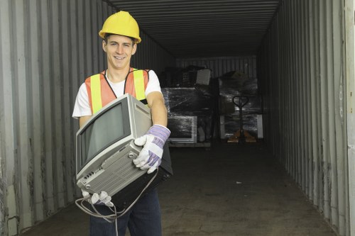 Professional team assessing loft clearance needs in Tottenham